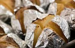 Stuffed potatoes baked in foil in the oven recipe with photo